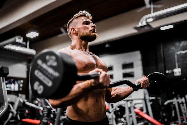 Person performing a barbell squat in correct form