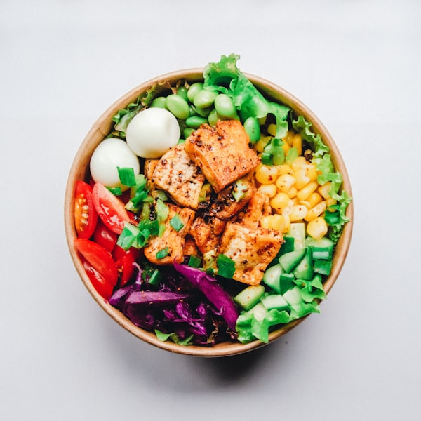 Fresh vegetable salad bowl with grains